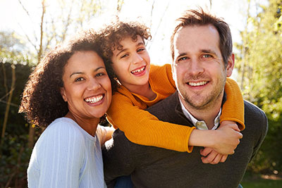 Smiling couple with kid 